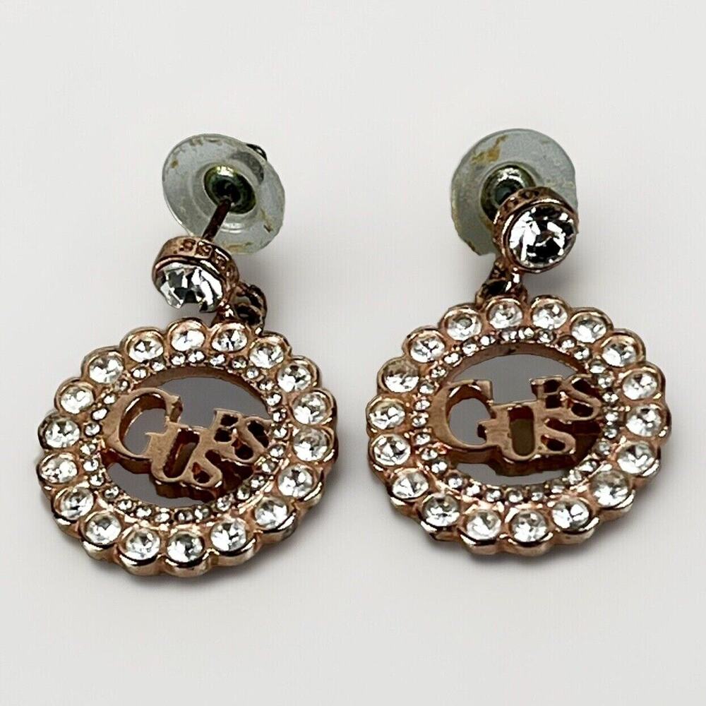 GUESS Women Rose Gold Tone Round Crystals LOGO Design Earrings- Dangle Drop Pair